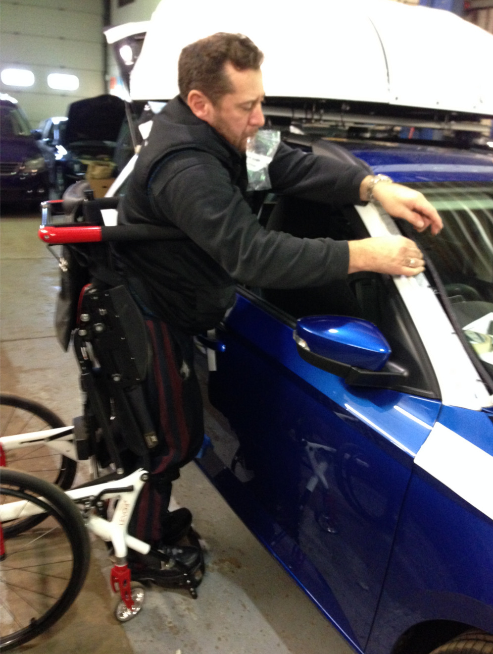 Andy working on a disabled car adaptation